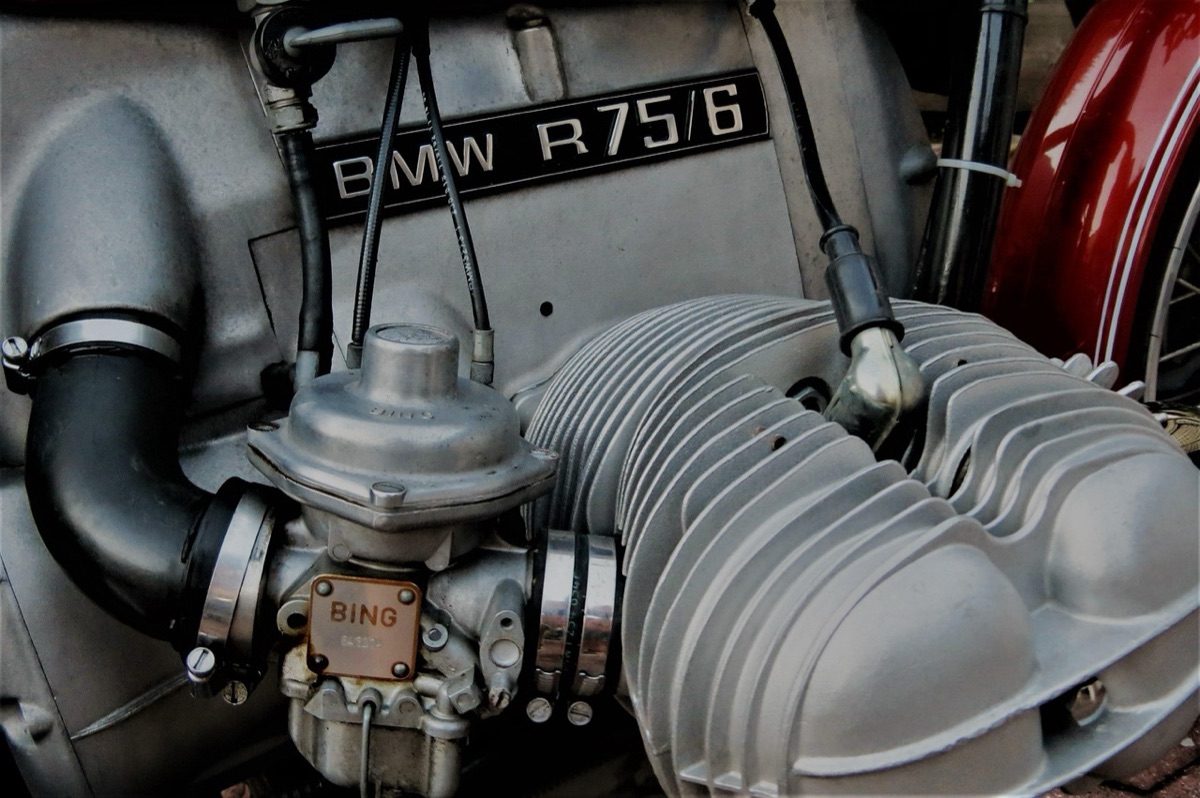electric vehicle and internal combustion engine side by side